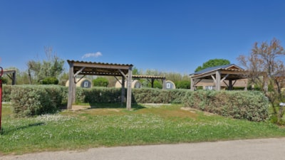 Camping pitch with arbor