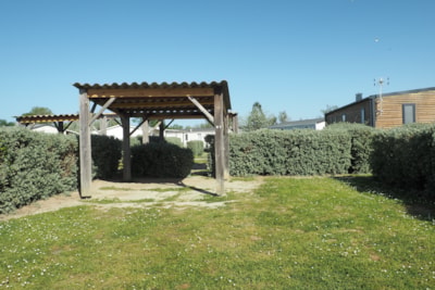 Camping pitch with arbor