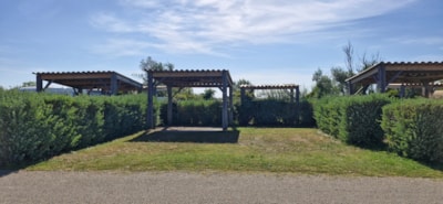Camping pitch with arbor