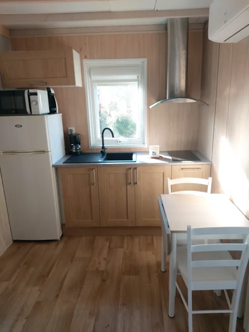 Location - Chalet Confort 16M² - 1 Chambre + Terrasse Couverte + Tv + Clim - image n°6 - Flower Camping de Mars