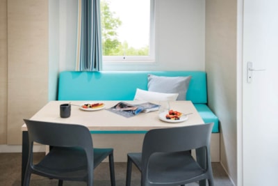 Mobile home Confort 29m² (2 bedrooms) + TV + Half-covered terrace