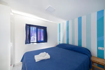 Mietunterkunft - Bungalow Superior (Klimaanlage, Tv, Föhn) - Holiday Village & Camping Nettuno