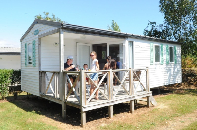 Mobilheim IROISE Standard 25,5m² - 2 Zimmer / Halbüberdachte Terrasse + TV