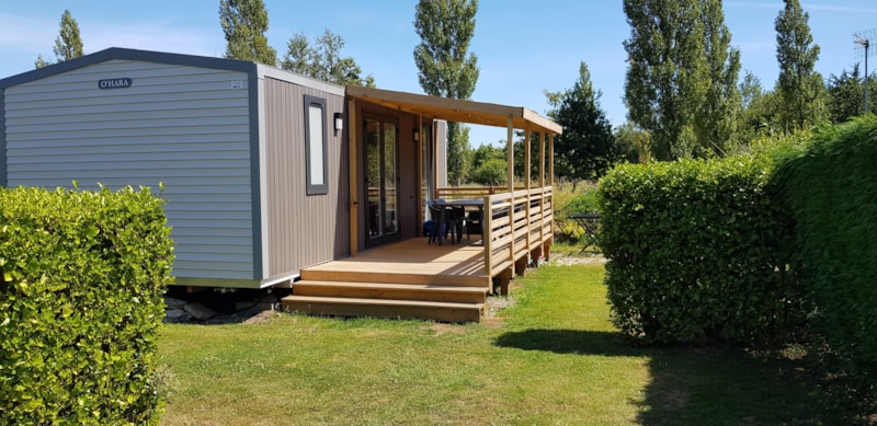 Mobilheim PENDRUC Premium 30m² - 2 Zimmer / überdachte Terrasse + TV