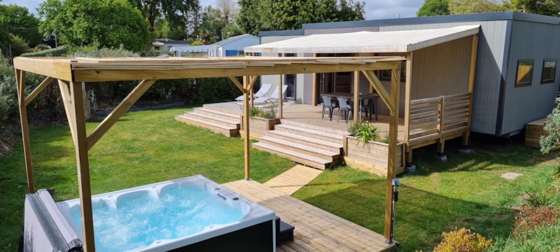 Mobilheim TAOS Premium SPA 40m² - 2 Zimmer - 2 badezimmer / überdachte Terrasse + TV