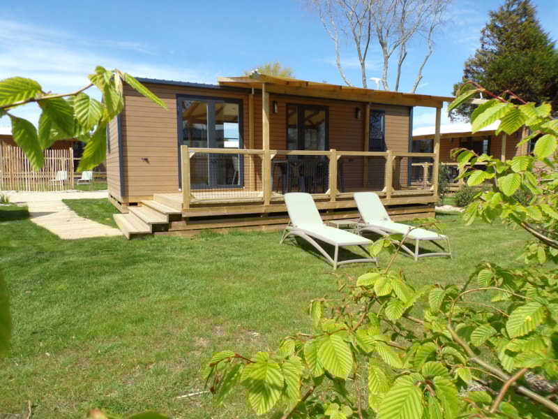 Mobilheim HORIZON Premium 31m² 2 Schlafzimmer / überdachte Terrasse + TV + bettbezug / Fußgängerzone