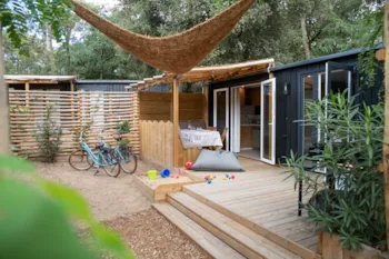 Mietunterkunft - Premium Mobilheim  Galet (2023) 31M² + Halbüberdachte Terrasse - Camping Les Cyprès