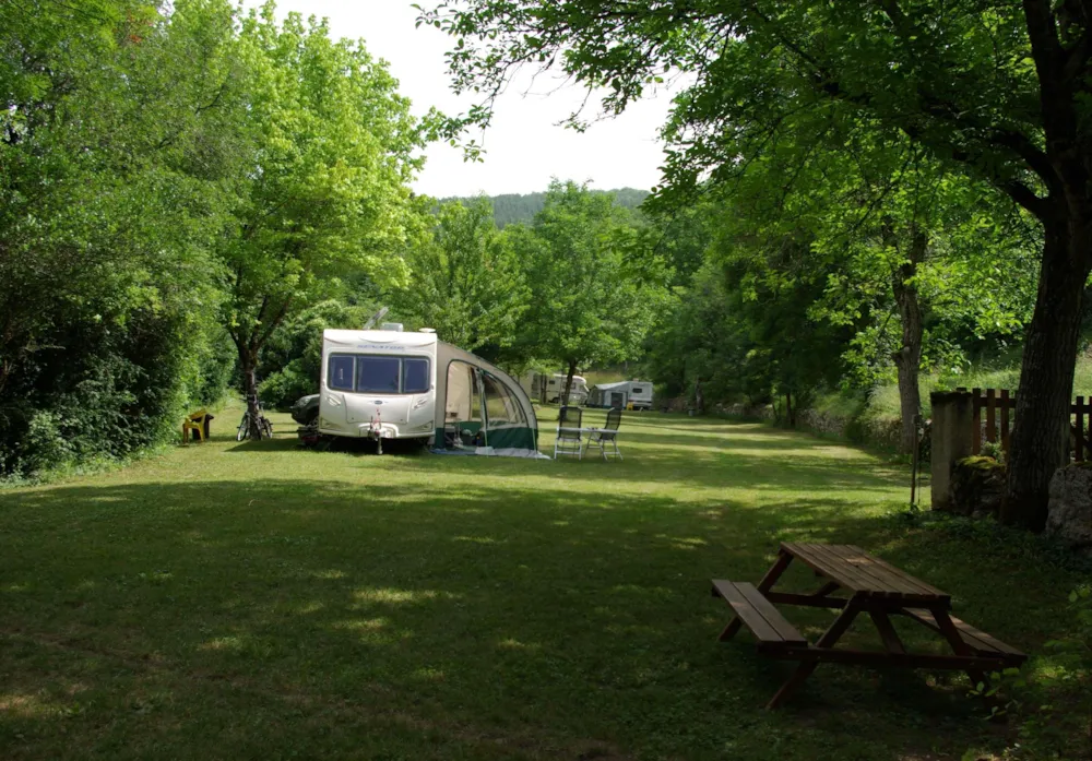 Camping pitch including 1 person and one vehicle