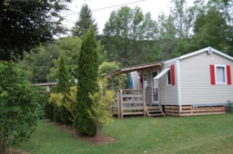 Location - Mobil-Home Lodge 24M² / 2 Chambres - Tv - Terrasse Couverte - Camping*** Le Repos du Baladin