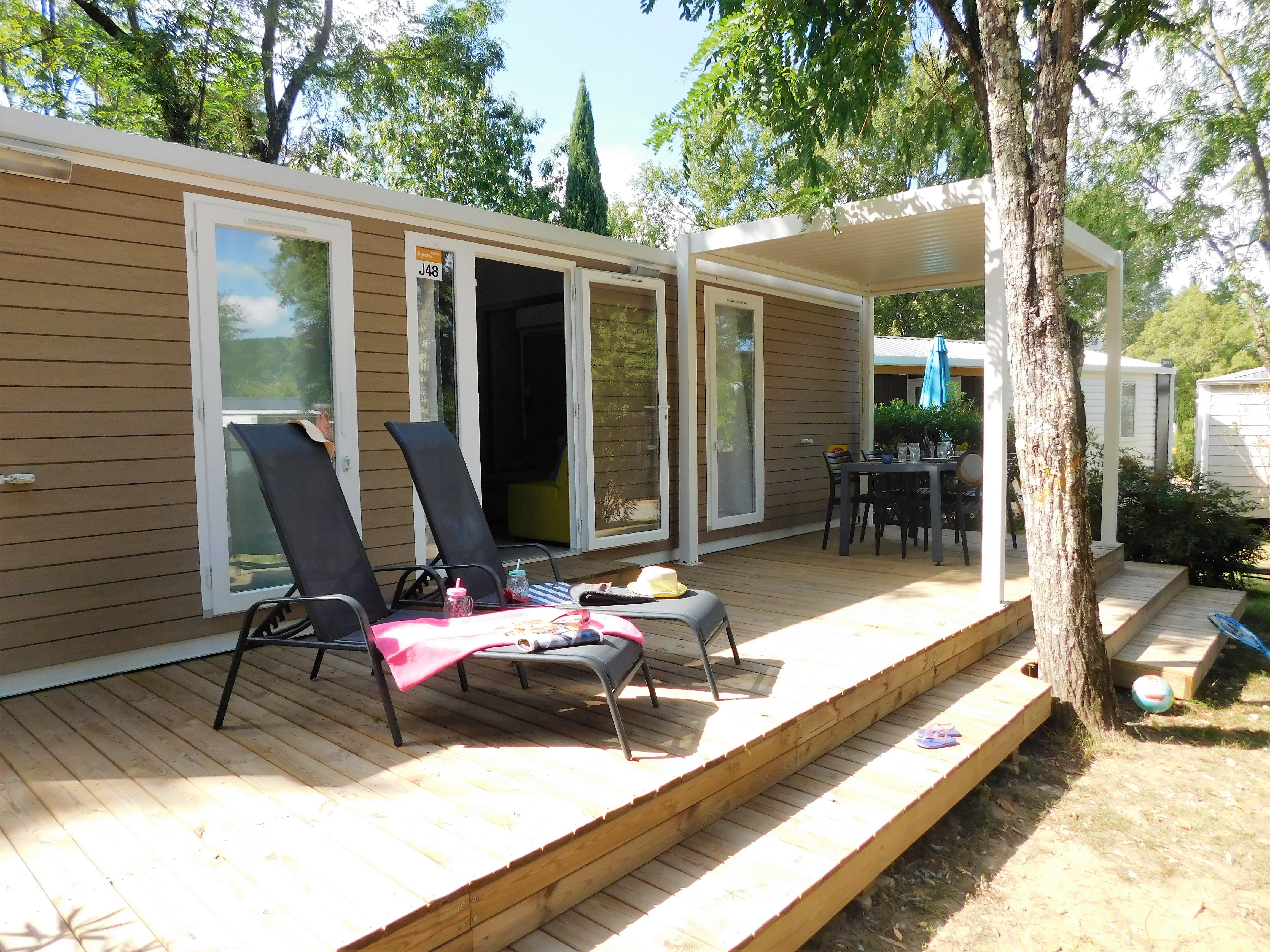 Mietunterkunft - Cottage  **** 2 Zimmer / 2 Badezimmer - Terrasse - Klimaanlage - Camping Sandaya SOLEIL VIVARAIS
