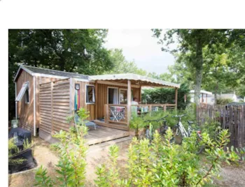 Mietunterkunft - Premium Klimatisiertes Mobilheim 33M² - 3 Sz + Halbüberdachte Terrasse + Tv + Bettwäsche + Handtüche - Flower Camping La Canadienne