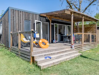 Mietunterkunft - Neu// Homeflower Premium Clim 29 M² – 2 Schlafzimmer + Halbüberdachte Terrasse + Tv + Bettwäsche + H - Flower Camping La Canadienne