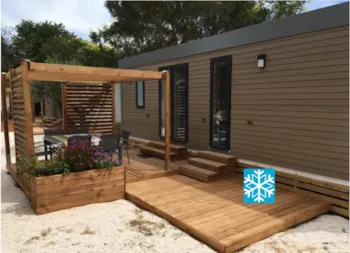 Mietunterkunft - Mobilheim Laurier Rose Premium (3 Zimmer) 33M2 - Überdachte Terrasse 19M² + Tv + Klimaanlage - Flower Camping Le Mas de Mourgues