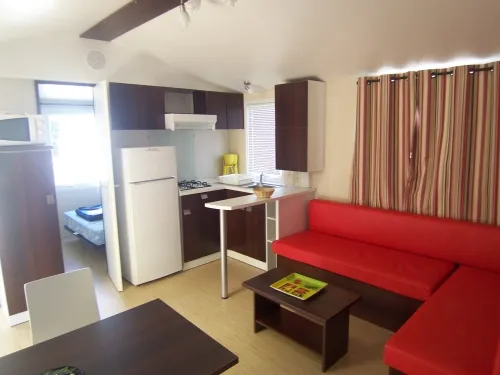 Location - Mobil Home Confort 32 M² 2 Chambres + Terrasse 12M² Semi-Couverte (9M²) + Tv - image n°2 - Flower Camping Le Riviera