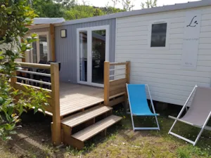 Locatif - Mobil home Premium 32 m² 2 chambres + terrasse 12m² semi-couverte (9m²) + TV + climatisation - Flower Camping Le Riviera