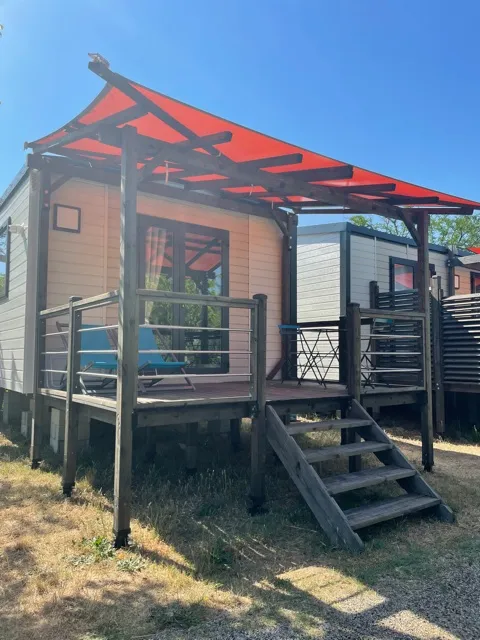 Accommodation - Mobile Home Premium 21M² 1 Bedroom + Terrace 12M² Semi-Covered (9M²) - Tv + Air Conditioning + River View - image n°1 - Flower Camping Le Riviera