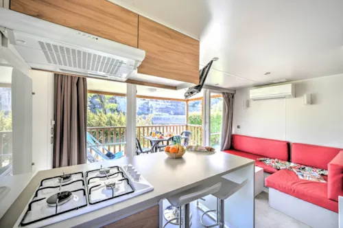 Accommodation - Mobile Home Premium 27 M² 2 Bedrooms + Tv + Air-Conditioning + River Vue - image n°3 - Flower Camping Le Riviera