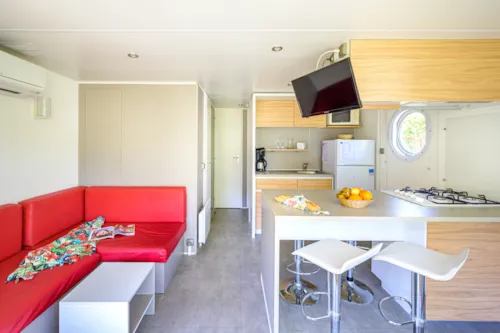 Accommodation - Mobile Home Premium 27 M² 2 Bedrooms + Tv + Air-Conditioning + River Vue - image n°4 - Flower Camping Le Riviera