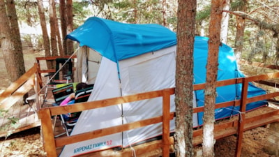 Accommodation in an already assembled camping tent — 1