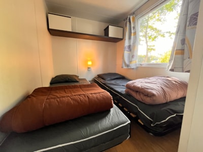 Mobile-home Confort 38m² 3 bedrooms + TV + sheltered terrace 18m² + 2 bathrooms