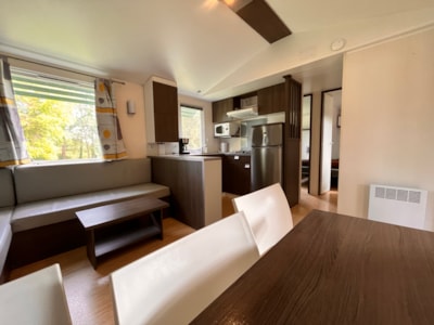 Mobile-home Confort 38m² 3 bedrooms + TV + sheltered terrace 18m² + 2 bathrooms