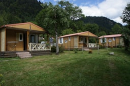 Huuraccommodatie(s) - Chalet Club 29M² + Terras Hazel Riverside - Camping La Vologne