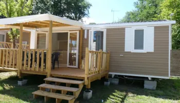 Huuraccommodatie(s) - Stacaravan  Rivierra  24M2 ,  Overdekt Terras - Camping Paradis Aloé