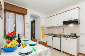 Mietunterkunft - Ferienwohnungen Perla 2 Zimmer - Camping Scarpiland