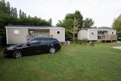 Mobil-home LE PATIO Standard 29m² (2bed-4pers) + 2SDB + integrated terrace 11m²+ TV