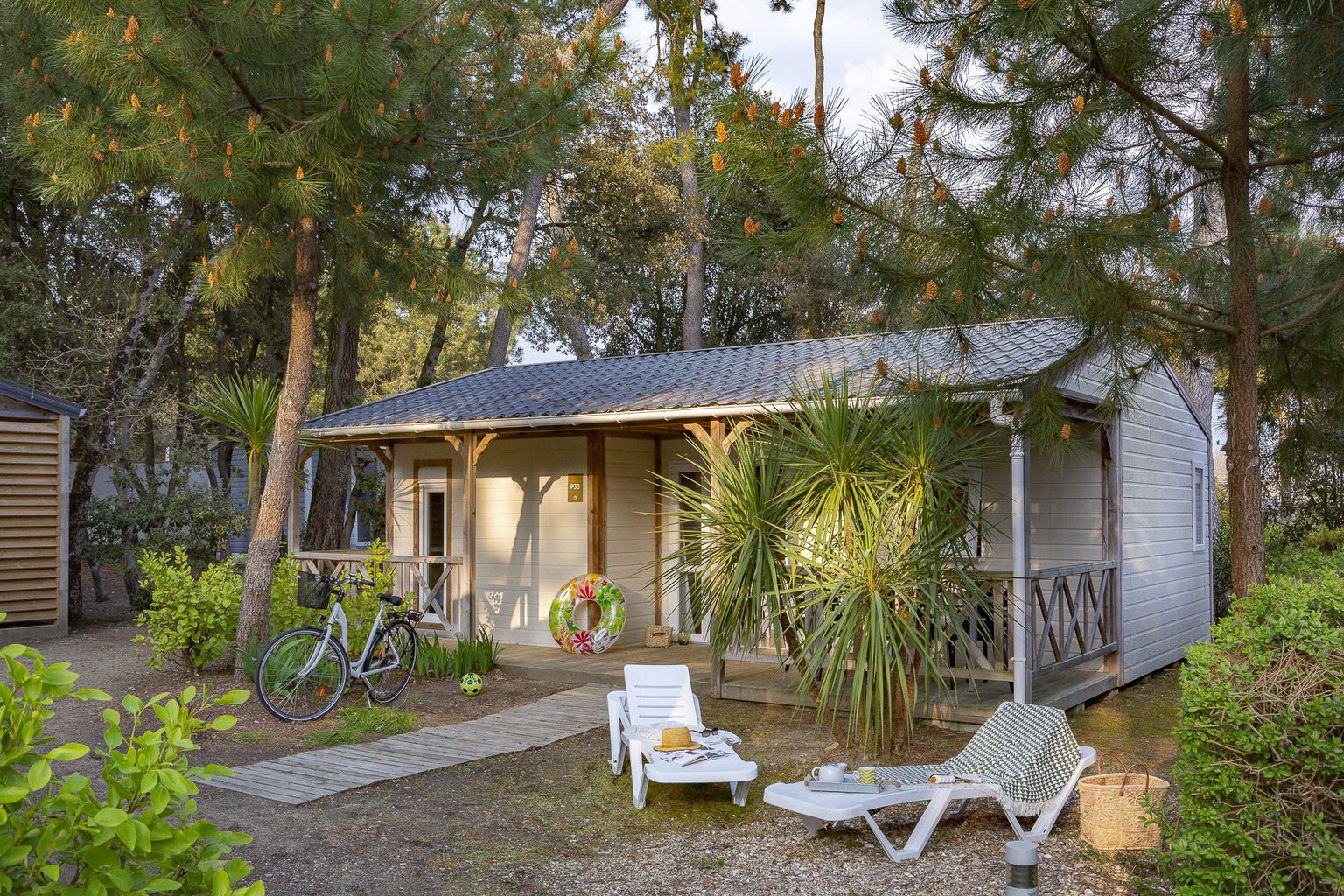 Location - Chalet Les Pins 3 Chambres **** - Camping Sandaya Le Littoral