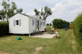 Mietunterkunft - Mobilheim Oakley 26M² + Gepflasterter Außenterrasse - CAMPING LES DRUIDES