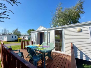 Mietunterkunft - Mobilheim Flores 30M² + Holzterrasse - CAMPING LES DRUIDES