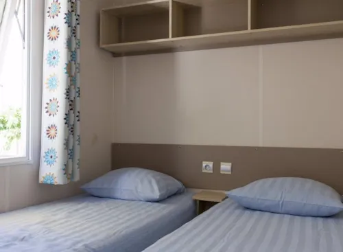 Location - Mobil Home – Type 6Lbv+ Acacia - 3 Chambres - image n°4 - RCN la Bastide en Ardèche
