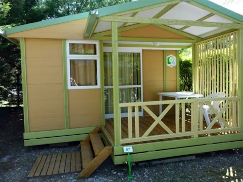 Mietunterkunft - Confort Tiny Chalet 20M² (1 Schlafzimmer - 2 Personen) + Überdachte Terrasse + Klimaanlage - image n°1 - Flower Camping Le Plan d'Eau - Ardèche