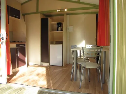 Huuraccommodatie(s) - Chalet Standard Nemo 20M²  2 Kamers - Half-Schaduwrijk Terras - image n°3 - Flower Camping Le Plan d'Eau - Ardèche
