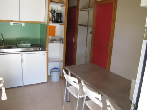 Location - Chalet Eden 5 Personnes 2 Chambres. - image n°3 - Camping Les Chênes Verts