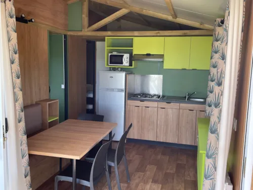 Mietunterkunft - Chalet Hékipia 5 Personnes  30M2 - image n°4 - Camping Les Chênes Verts