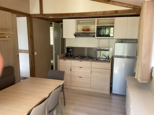 Mietunterkunft - Chalet Hékipia 5 Personnes  30M2 - image n°5 - Camping Les Chênes Verts