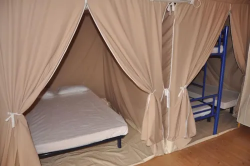 Location - Bungalow Toilé Canada 2 Chambres - Sans Sanitaire - image n°6 - Camping Paradis - Bois Simonet