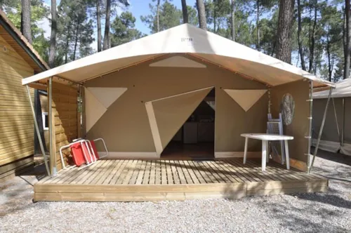 Location - Bungalow Toilé Canada 2 Chambres - Sans Sanitaire - image n°2 - Camping Paradis - Bois Simonet