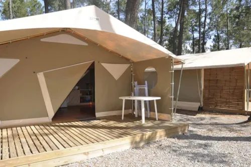 Location - Bungalow Toilé Canada 2 Chambres - Sans Sanitaire - image n°3 - Camping Paradis - Bois Simonet