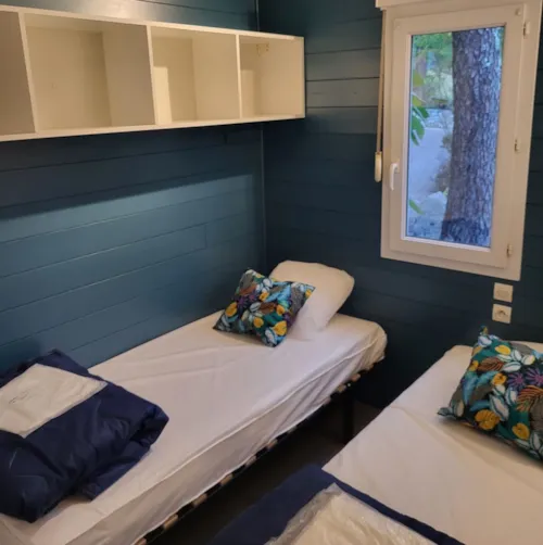 Location - Chalet Mimosa Bleu - 3 Chambres - image n°4 - Camping Paradis - Bois Simonet