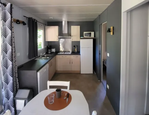 Location - Chalet Acacia - 2 Chambres - image n°4 - Camping Paradis - Bois Simonet