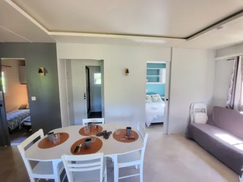 Location - Chalet Acacia - 2 Chambres - image n°3 - Camping Paradis - Bois Simonet