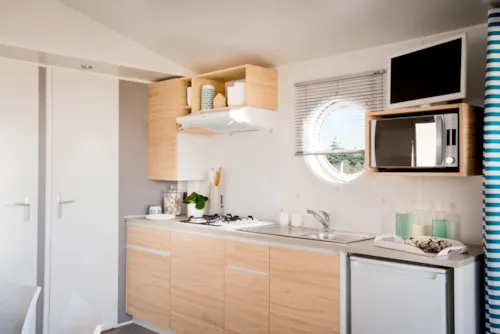 Accommodation - Mobil Home First - 2 Bedrooms - 35 M² - Terrace - Air Conditioning - Tv - Dishwasher. - image n°4 - Camping du Pont