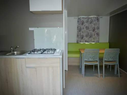 Accommodation - Mobile Home Cosy - 2 Bedrooms - Air Conditioning - Covered Wooden Terrace - image n°2 - CAMPING LE CHASSEZAC