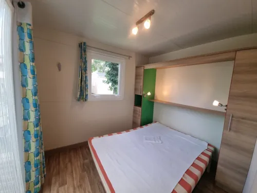 Mietunterkunft - Klimatisiertes Chalet Lagon 1/6 Pers. - image n°5 - Camping le Verger de Jastres