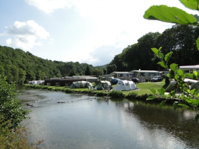 Small pitch at the riverbank+ car + tent + electricity