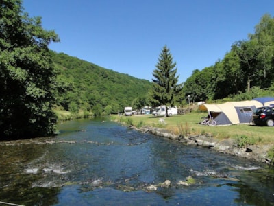 Pitch at the riverbank + Camper or Car and caravan + Electricity