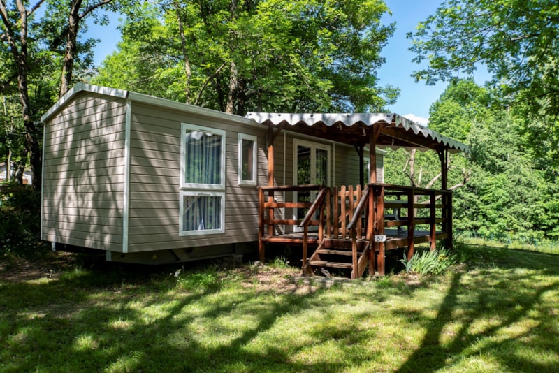 Mobilheim 25m² - überdachte Terrasse -  - Blick auf den Fluss